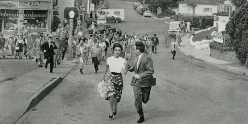 Kevin McCarthy and Dana Wynter are running for their lives from Body Snatchers