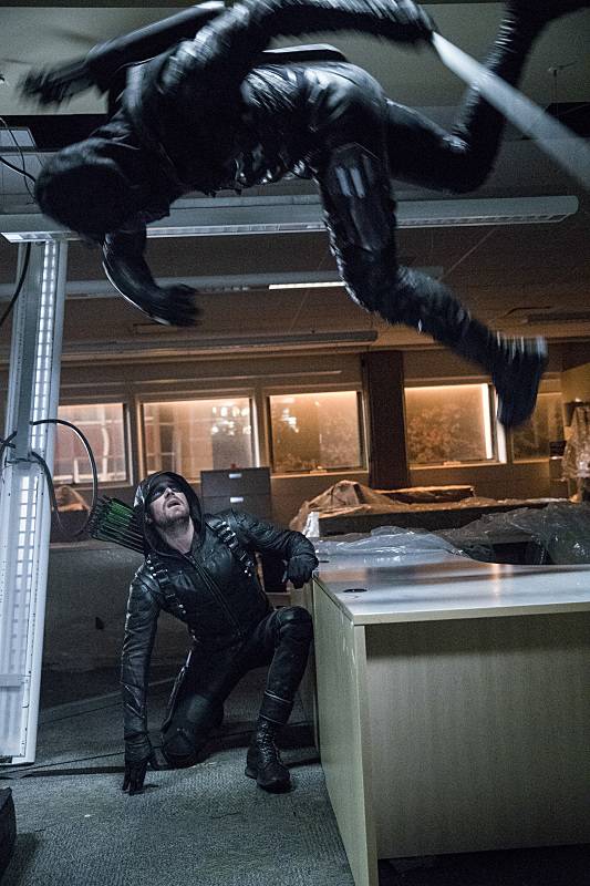 Arrow & Prometheus Have an Explosive Confrontation in New Photos