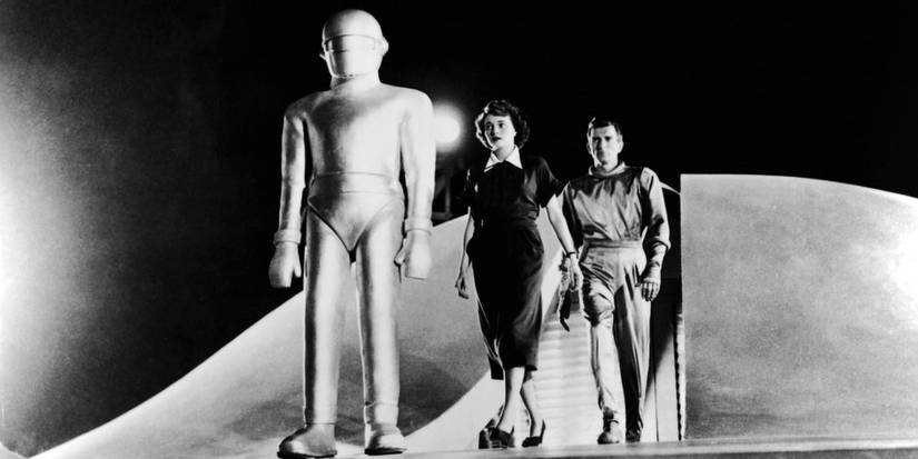 A robot leading a couple in The Day The Earth Stood Still