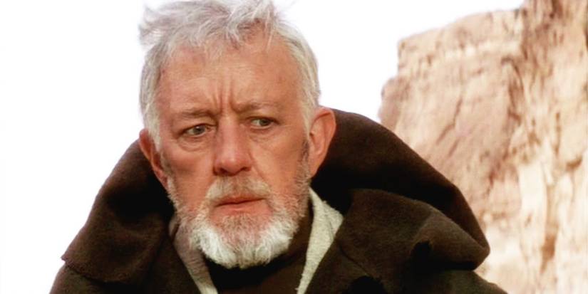 Ben Kenobi (Alec Guinness) looks concerned in A New Hope