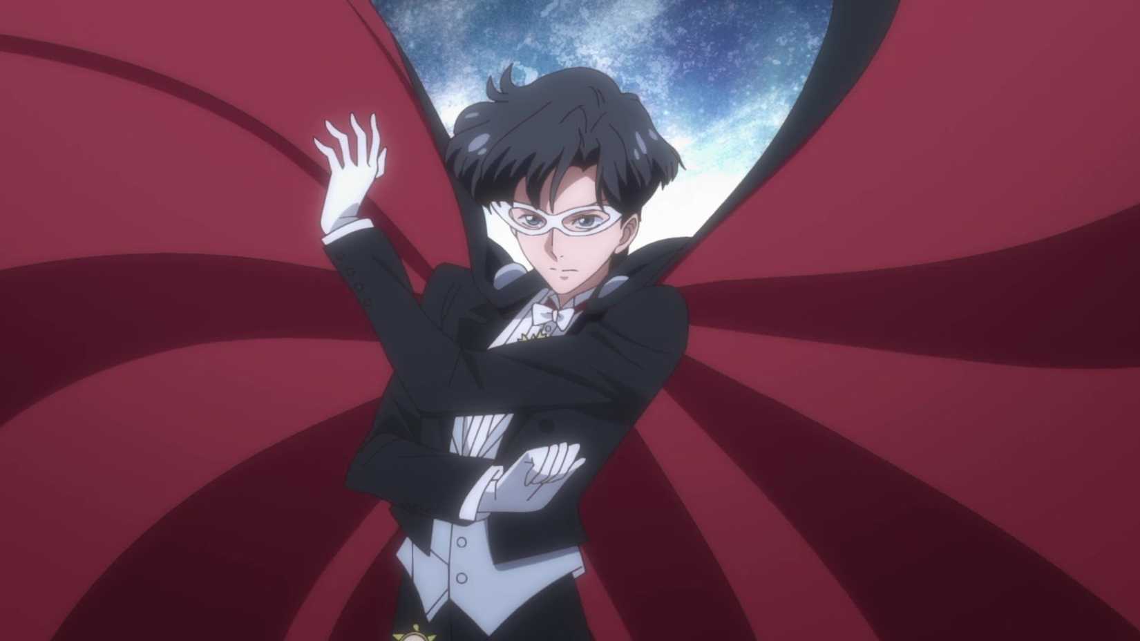 Tuxedo Mask poses with his cape flying in Sailor Moon Crystal.