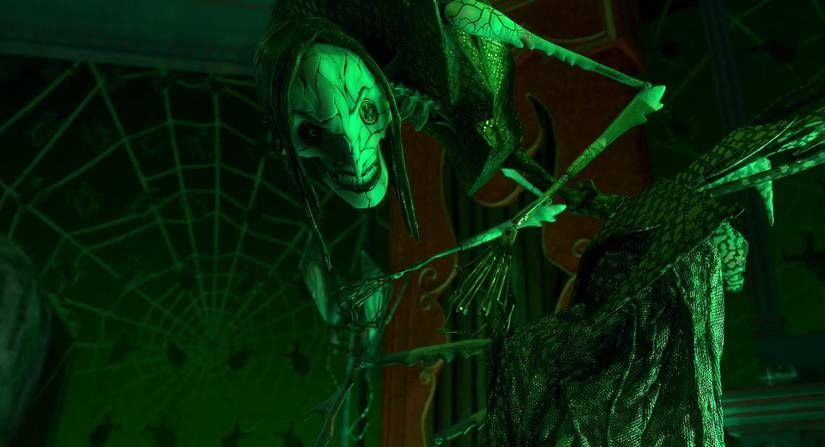Bedlam smiles in a sinister fashion during Coraline