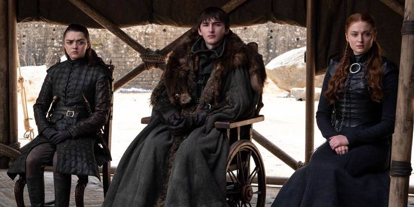 Bran Stark sits with his sisters in the Game of Thrones finale.