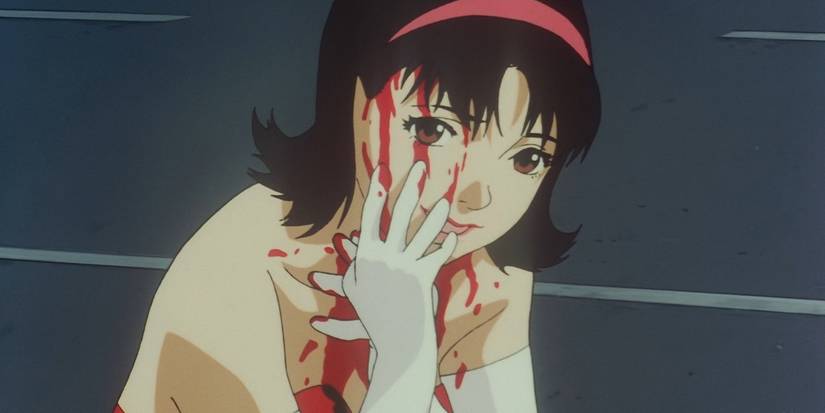Mima is covered in blood and is smiling in the anime Perfect Blue.