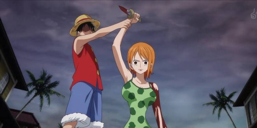 The monkey D. Luffy prevents Nami from cutting his tattoo of pirate arlong in one room