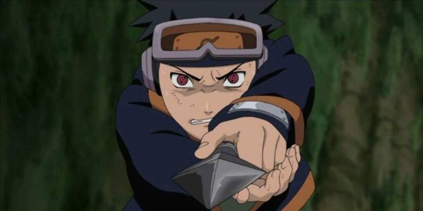 Obito Uchiha awakens his Sharingan and stabs a Stone Ninja with a kunai during Naruto's Third Great Ninja War