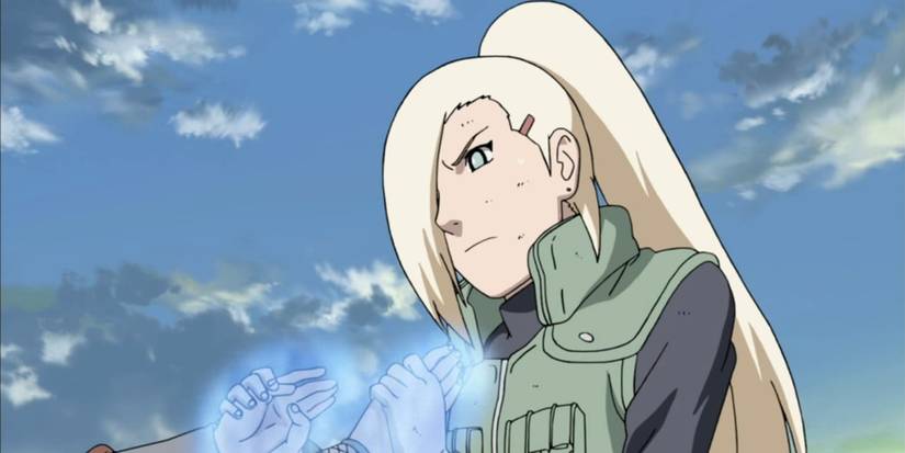Ino Yamanaka holding glowing hands with the sky in the background