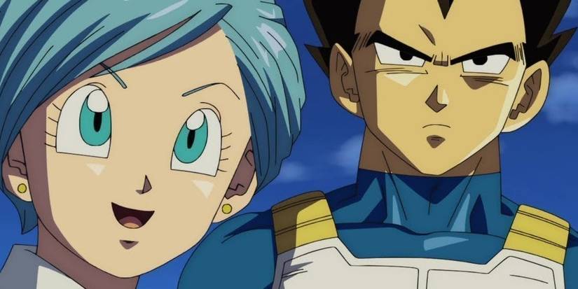 Bulma standind next to Vegeta smiling