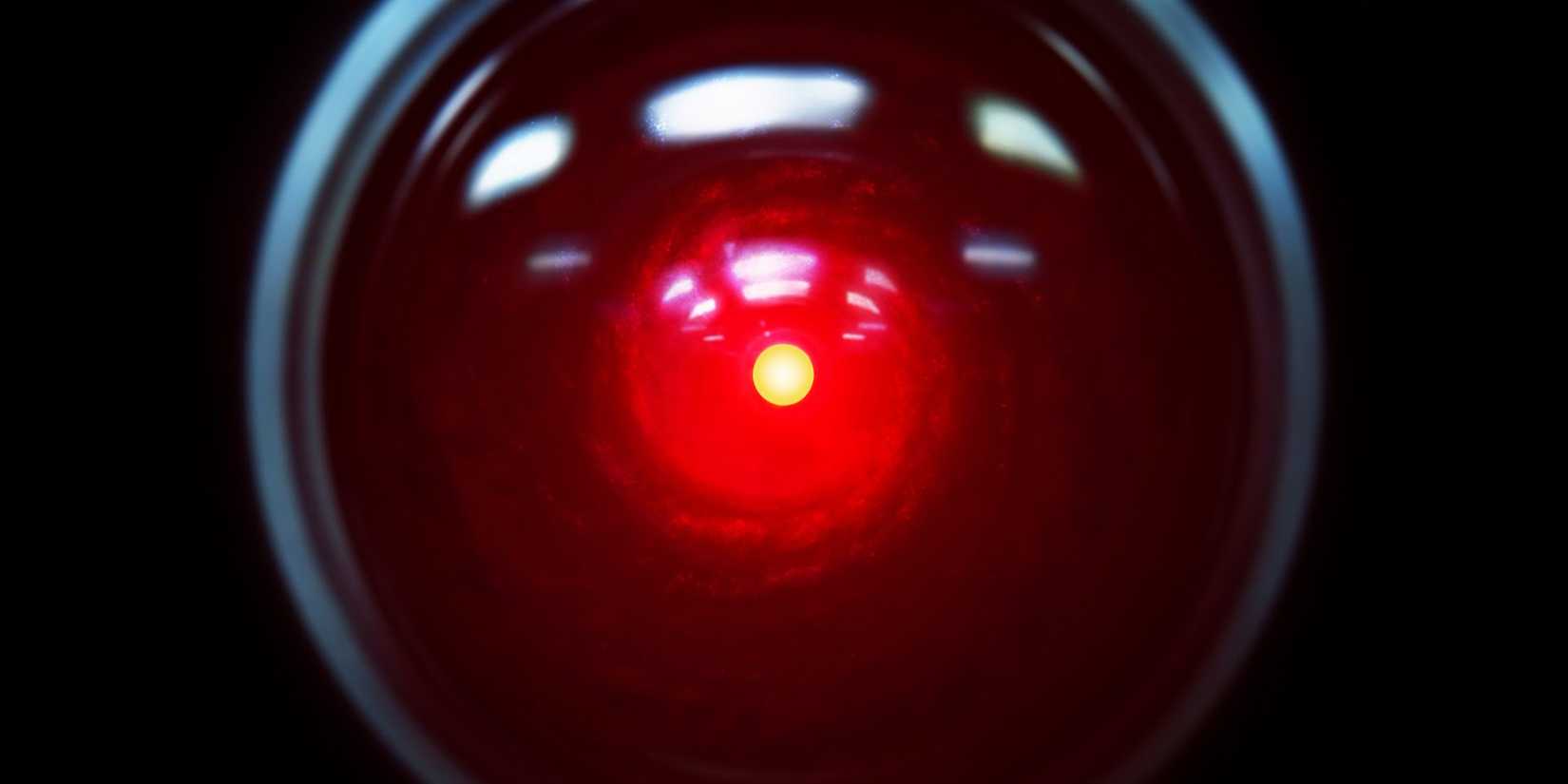 A close up shows the Hal 9000 "eye" from 2001: A Space Odyssey.