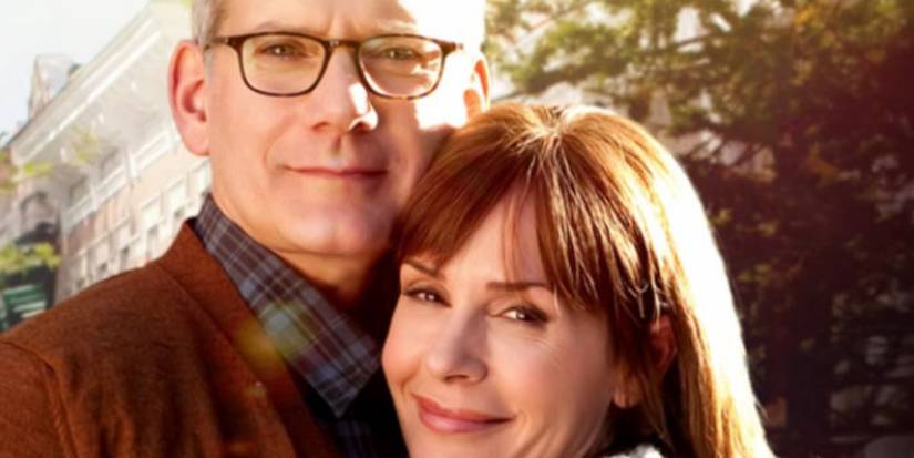 A still from the Amazing Spider-Man films shows Richard and Mary Parker smiling