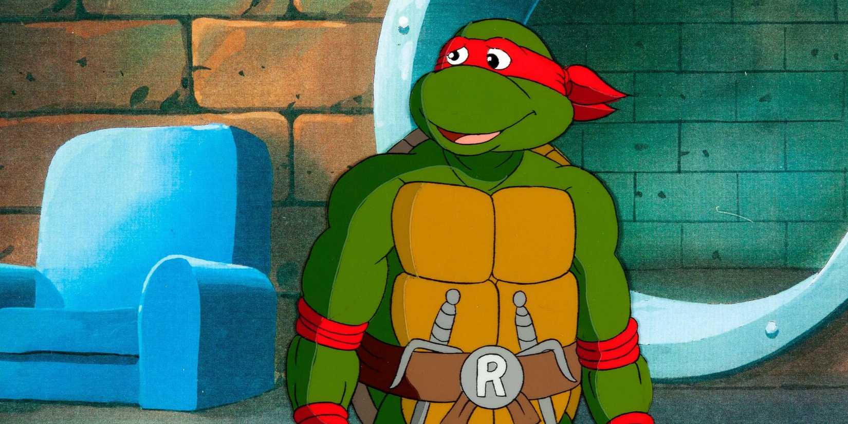 Raph in the 1987 Teenage Mutant Ninja Turtles cartoon smiling.