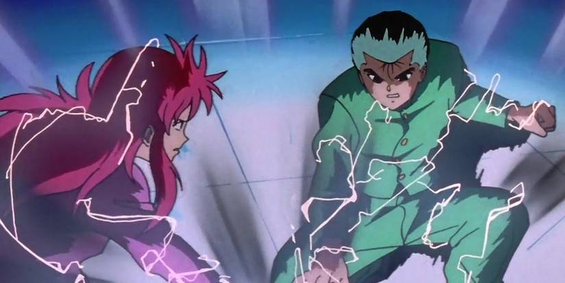 Yusuke blocks Kurama's attack in Yu Yu Hakusho.