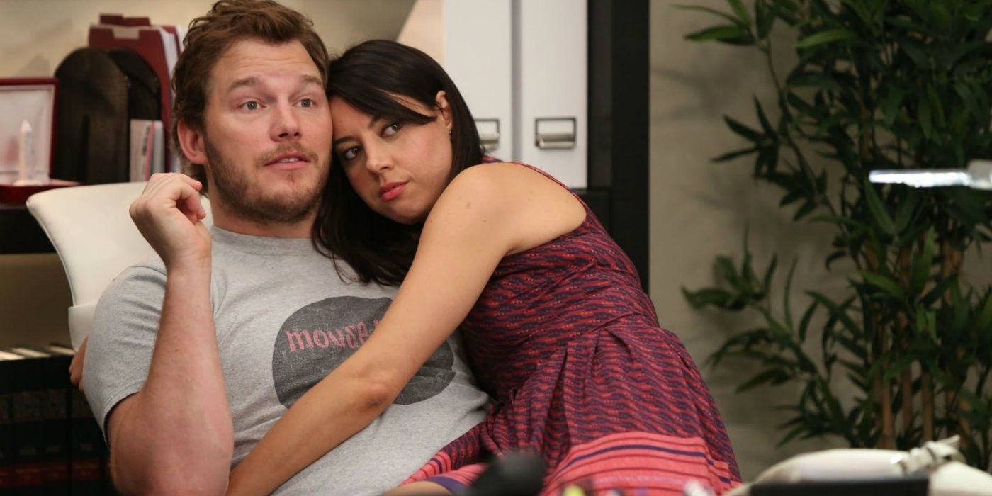 April hugs Andy in Ben's Washington office in Parks and Recreation. 