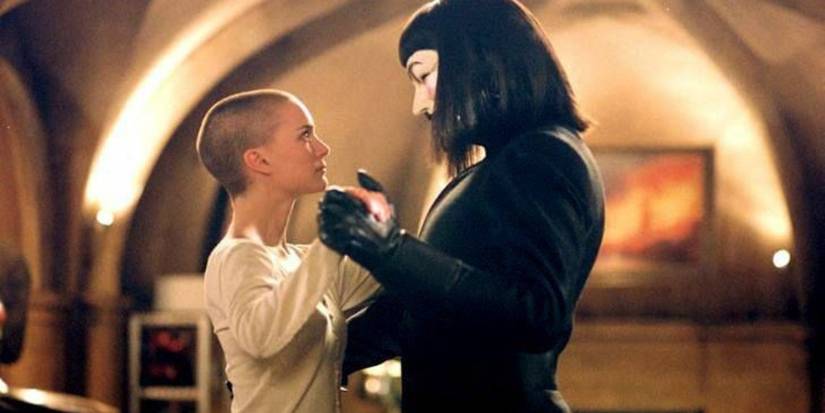 Natalie Portman as Evey Hammond and Hugo Weaving as V dance together in V for Vendetta.