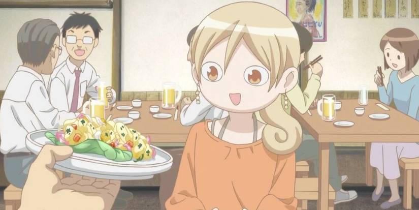 A woman staring at food in Wakakozake.
