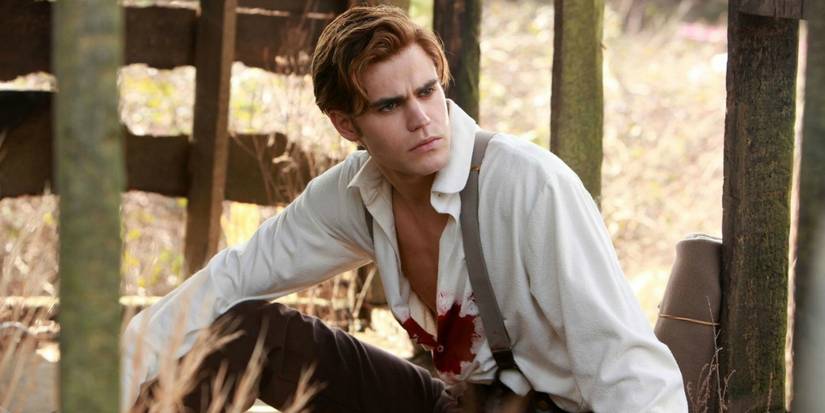 Stefan (played by Paul Wesley) is wearing a bloody shirt in The Vampire Diaries.