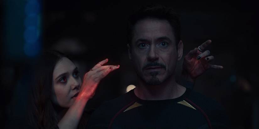 Wanda using her magic on Tony Stark.