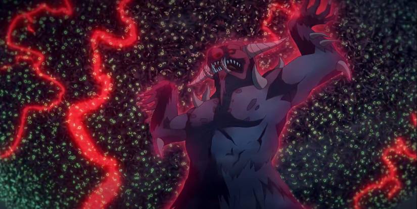 Isaac's giant night creature lifting a ball of humans.