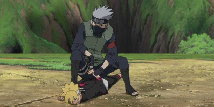 Kakashi pinning Boruto's arm behind his back as he tries to teach him Resolve