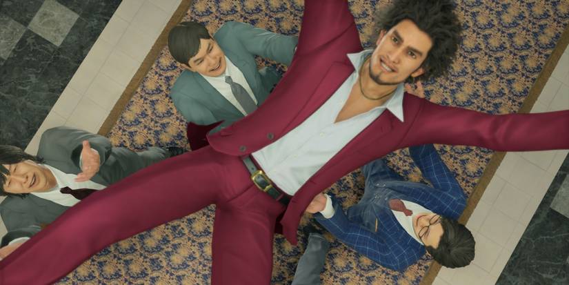 Ichiban Kasuga wears a red suit while being thrown in the air in Yakuza: Like a Dragon.