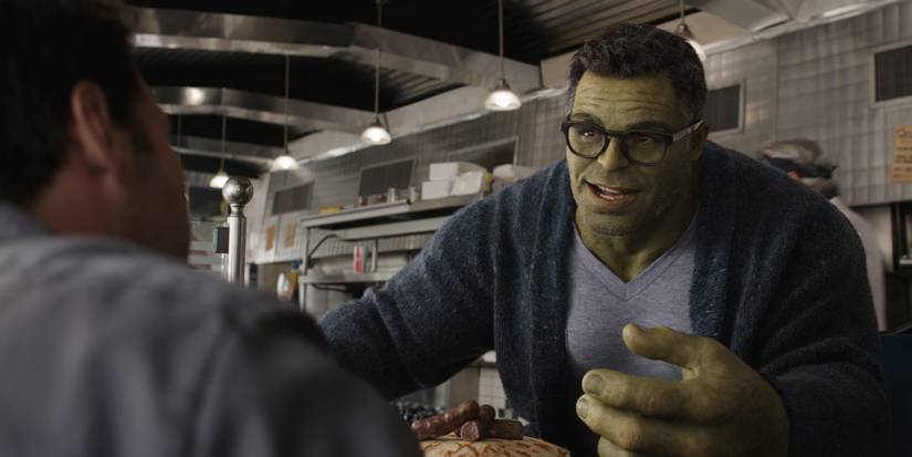 Professor Hulk smiles while talking with Scott Lang in a diner.