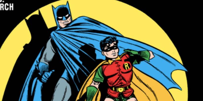 The cover of Batman #9 from the Golden Age shows Batman and Robin in a spotlight.