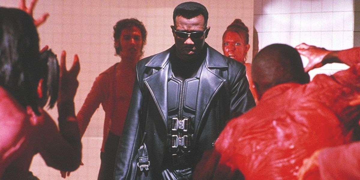 Blade (Wesley Snipes) runs through the vampire rave party