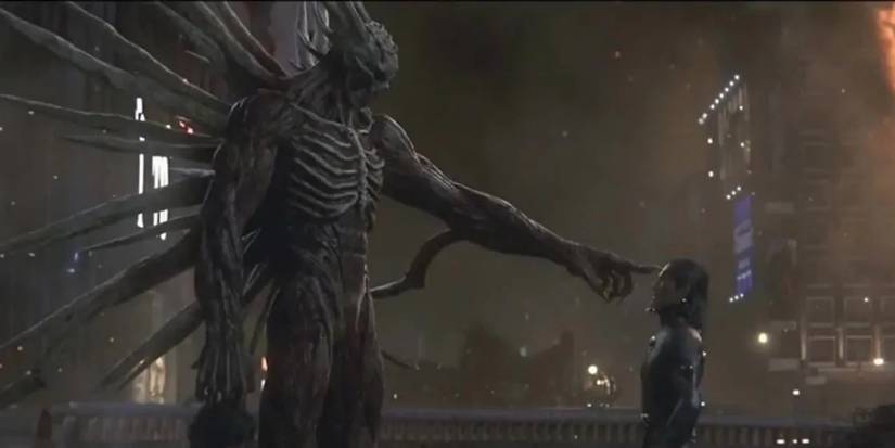 An alien enemy points at a soldier in Gantz: O.