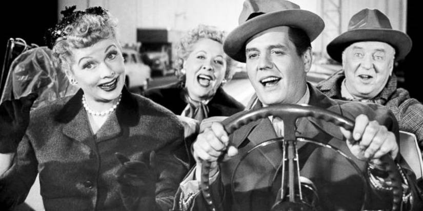 Lucy, Ricky, Ethel, and Fred laugh on the promo banner for I Love Lucy