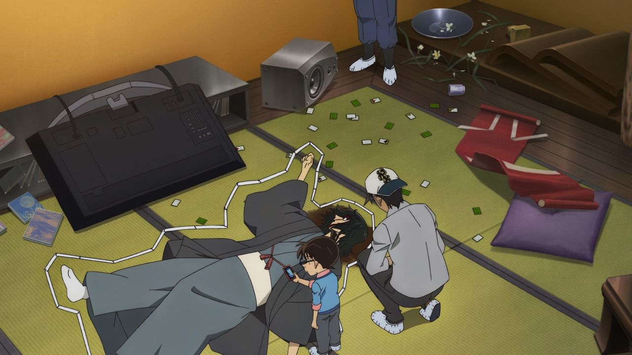 Detectives look at a body on floor with karuta cards in Detective Conan: Case Closed