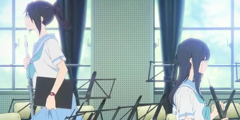 Nozomi walks away from Liz, who is sitting in Liz and the Blue Bird.