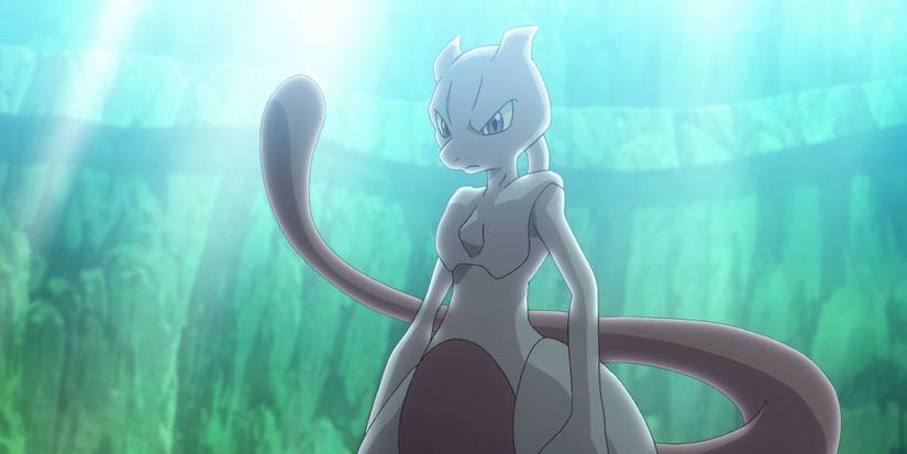 Mewtwo stands there as sun shines down behind him in Pokemon Journeys