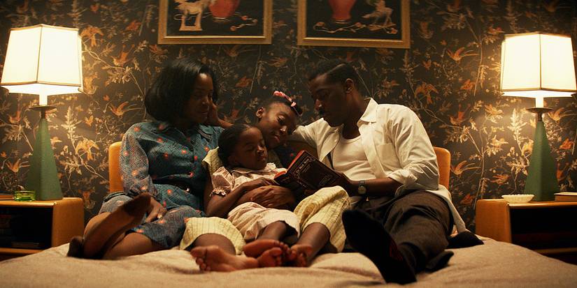 The Emory family bond in bed together in Amazon Prime Video's Them