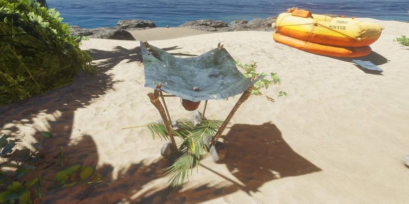 A beach camp with raft in stranded deep