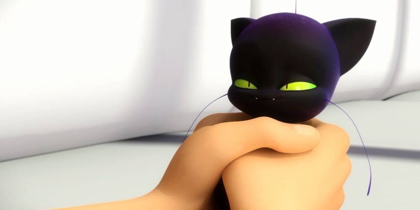 Plagg is caught in Adrian's hands in Miraculous Ladybug.