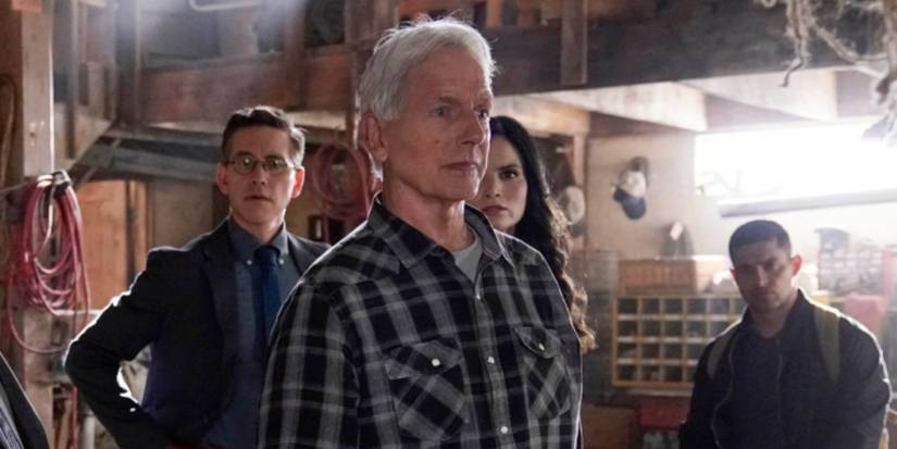 Gibbs with his team in a barn