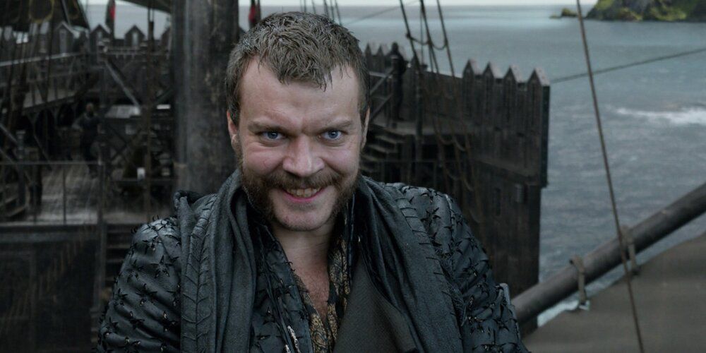 Euron Greyjoy grins aboard his ship while aiming at a dragon