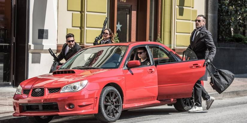 Opening chase scene from Baby Driver where Baby drives a red car