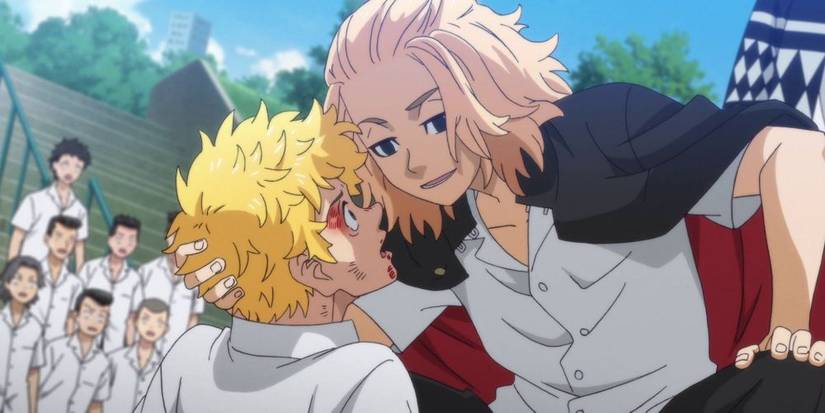 Mikey stands over Takemichi