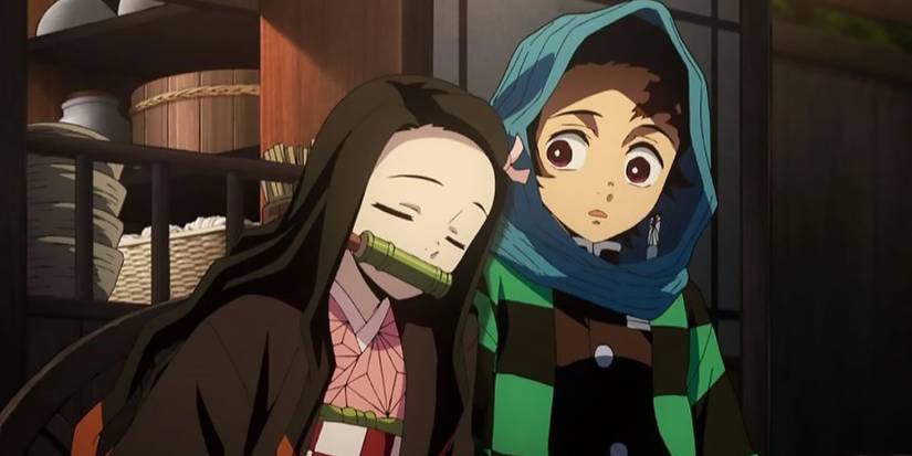 Nezuko dozes off on Tanjiro's shoulder.