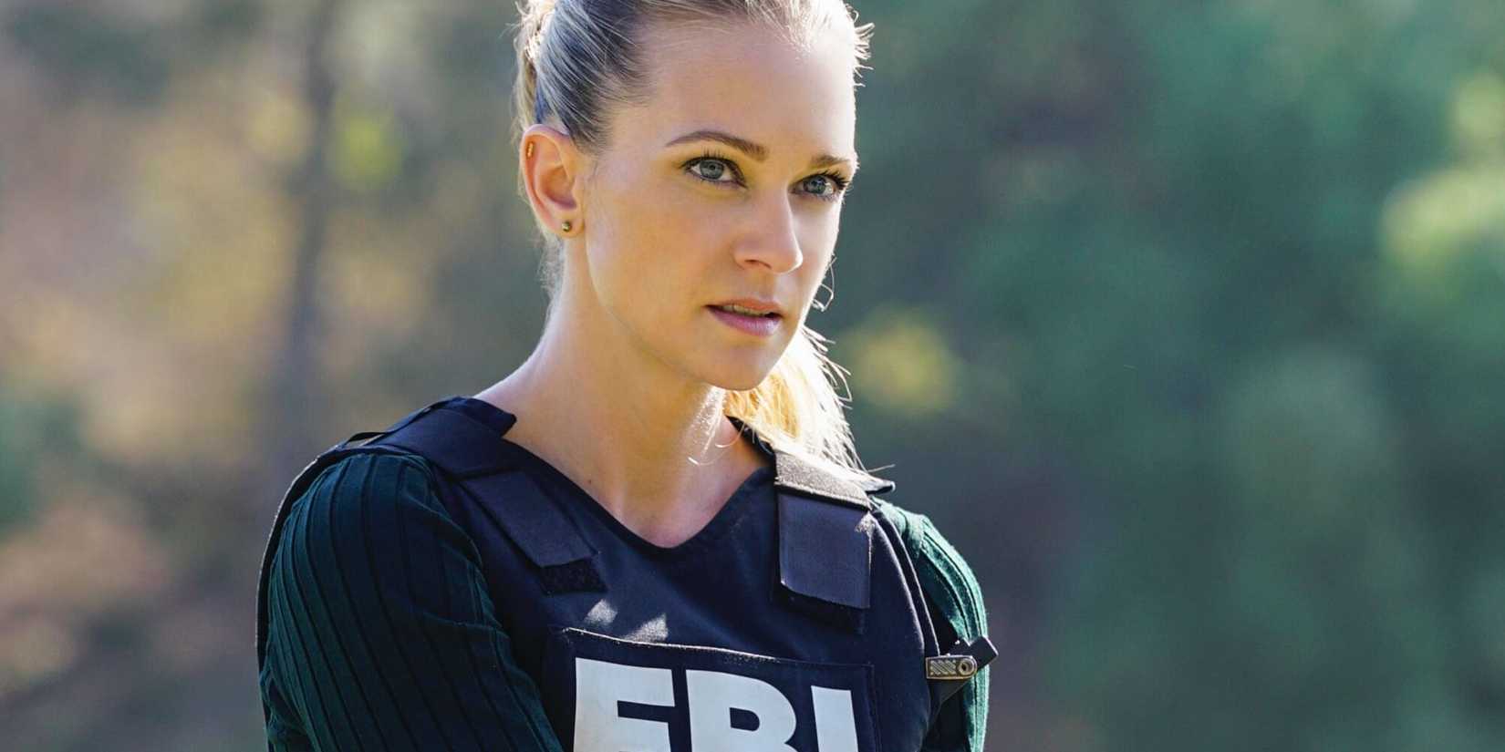 JJ in Criminal Minds is wearing an FBI vest and looking concerned