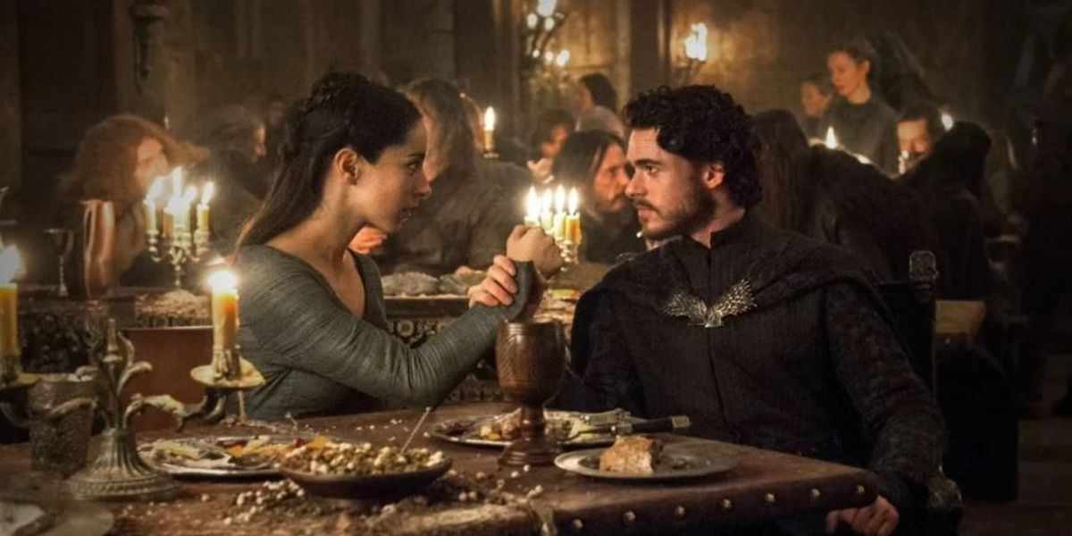 Robb Stark and Talisa hold hands at the Red Wedding in Game of Thrones