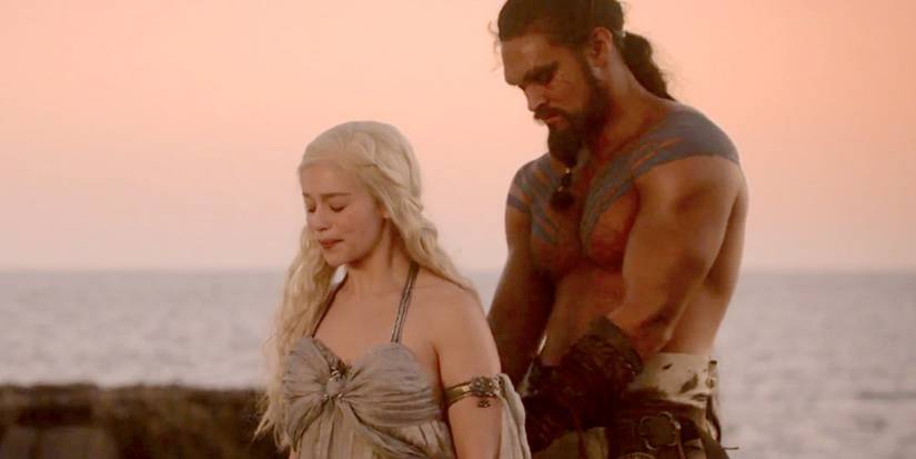 Khal Drogo undresses Dany on their wedding night in Game of Thrones.