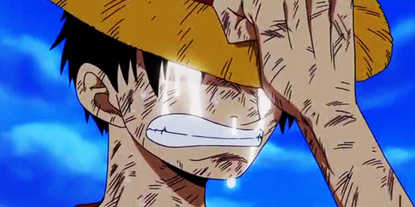 One Piece Luffy Şapkasını yerinde tutarken ağlıyor