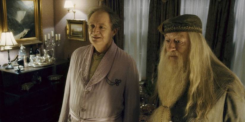 Slughorn and Dumbledore stand together in Harry Potter and the Half-Blood Prince.