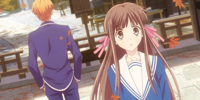 Fruits Basket Tohru choqué à côté de Kyo, le dos tourné