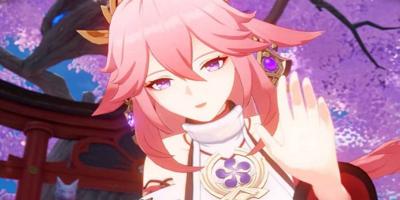 Yae Miko waving in Genshin Impact.