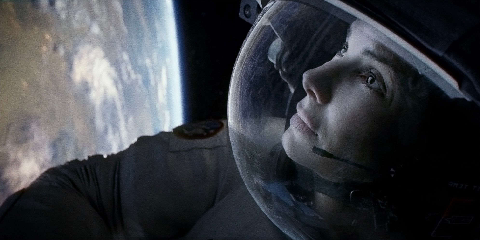 Sandra Bullock floating above the earth in the 2013 science fiction film, Gravity