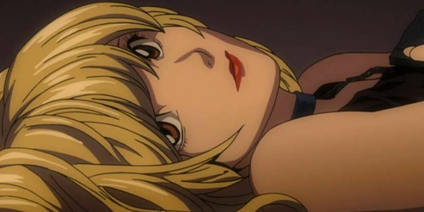Misa Amane from Death Note laying down and looking to the side.