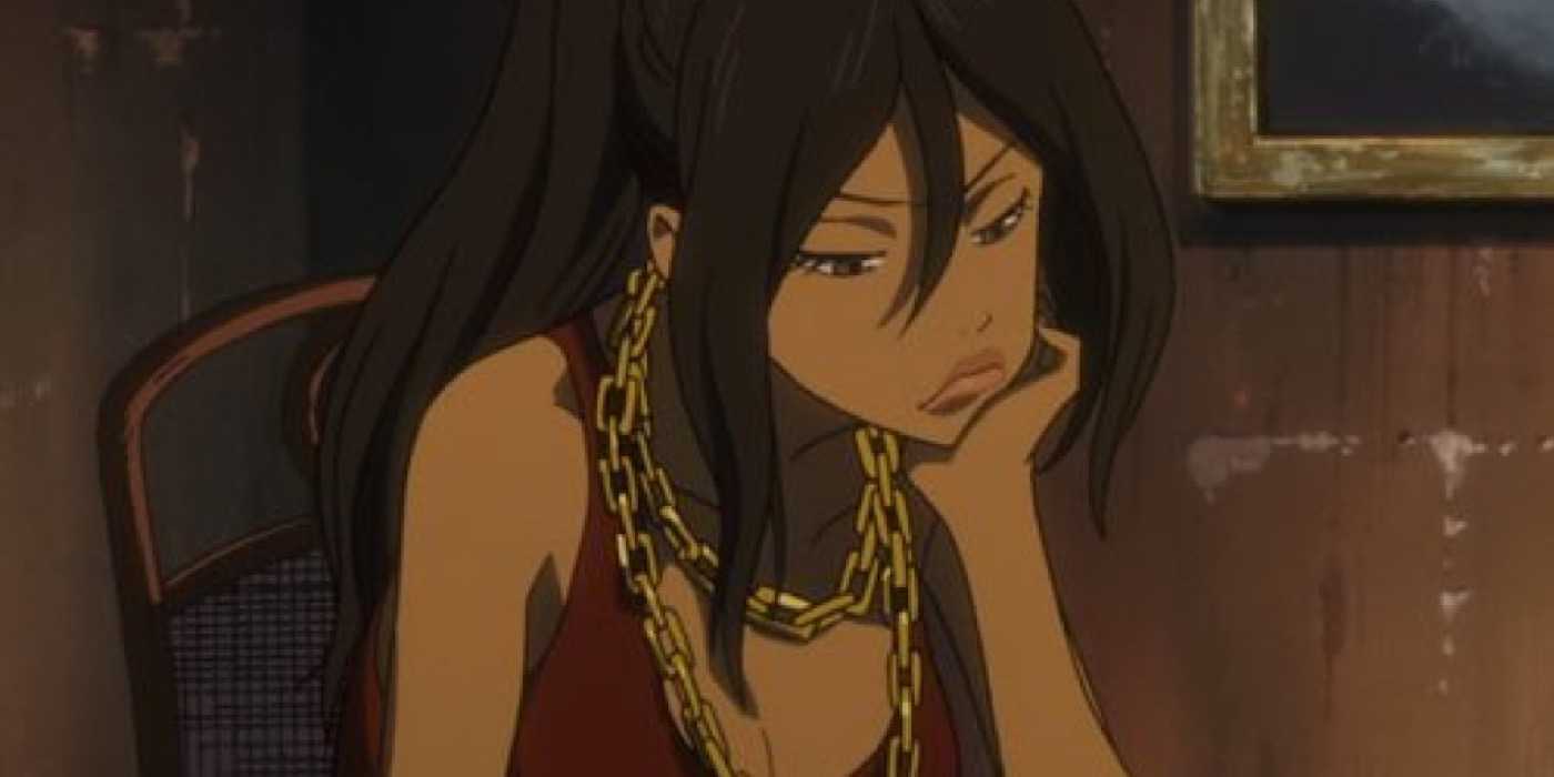 Michiko Malandro leans her head on her hand with a disgruntled expression in Michiko & Hatchin.